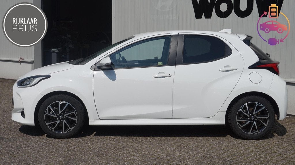 Toyota Yaris 1.5 Hybrid A/T 115PK Clima | Cruise | Carplay, Auto's, 12 maanden, Gebruikt, Euro 6, Wit