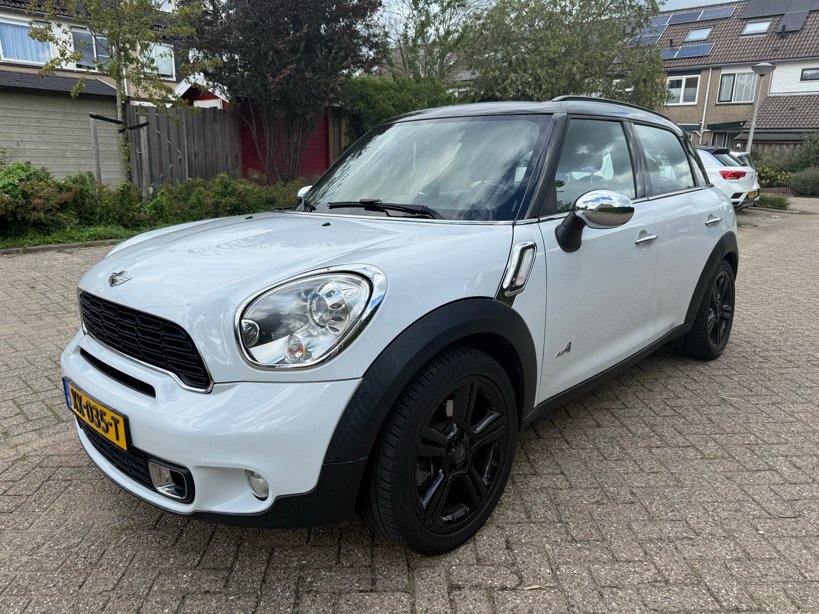 Mini Countryman S ALL4 R60 model uit 2010, Auto's, 1380 kg, Zwart, Wit, Leder