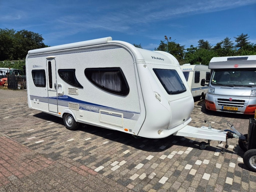 Hobby 495 UL Lavita BJ. 2009 Enkele bedden Luifel / Mover, Caravans en Kamperen, Caravans, 2 aparte bedden, Schokbreker, Rondzit