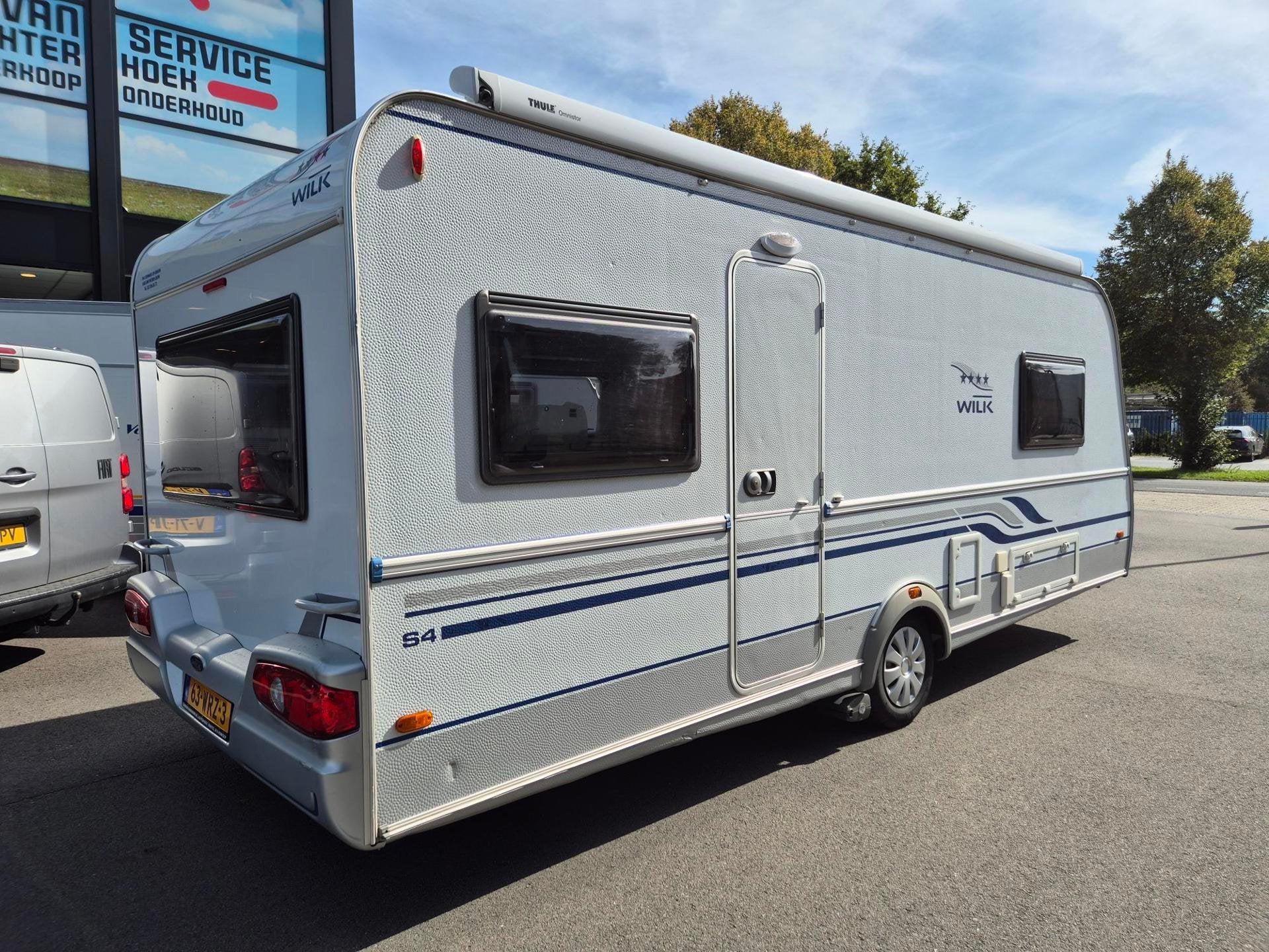 Wilk S4 530 EU Enkele bedden rondzit mover luifel TV 2e eig, Caravans en Kamperen, Rondzit, Bedrijf, 5 tot 6 meter, Wilk