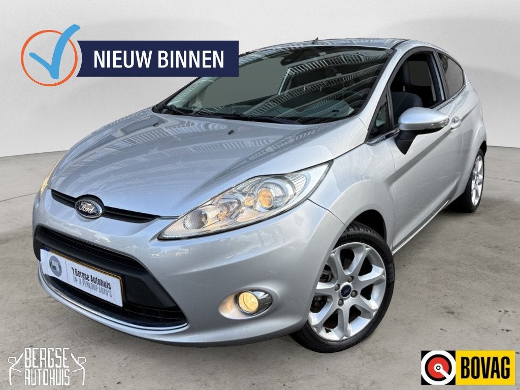 Ford Fiesta 1.25 Titanium Cruise Ecc Pdc lmv (bj 2010), Euro 5, Stof, 4 cilinders, 82 pk