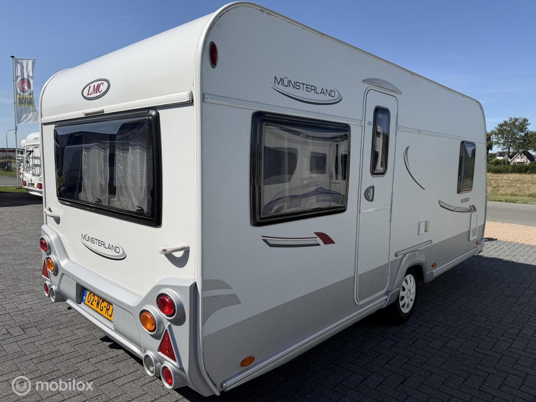 Lmc MUNSTERLAND MUSICA 470 D - Mover , Voortent, Caravans en Kamperen, Rondzit, Bedrijf, Hordeur, LMC en Münsterland