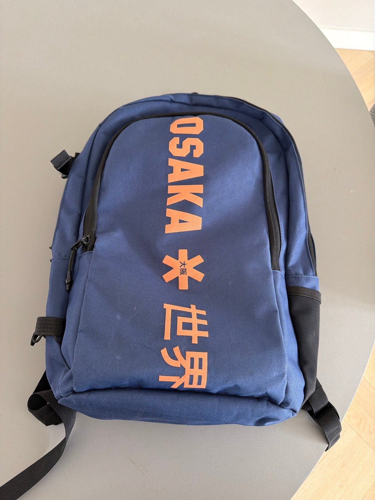 Osaka Hockey Rugtas - Blauw met Oranje Opdruk, Gebruikt, 25 tot 40 cm, Ophalen of Verzenden, Overige merken