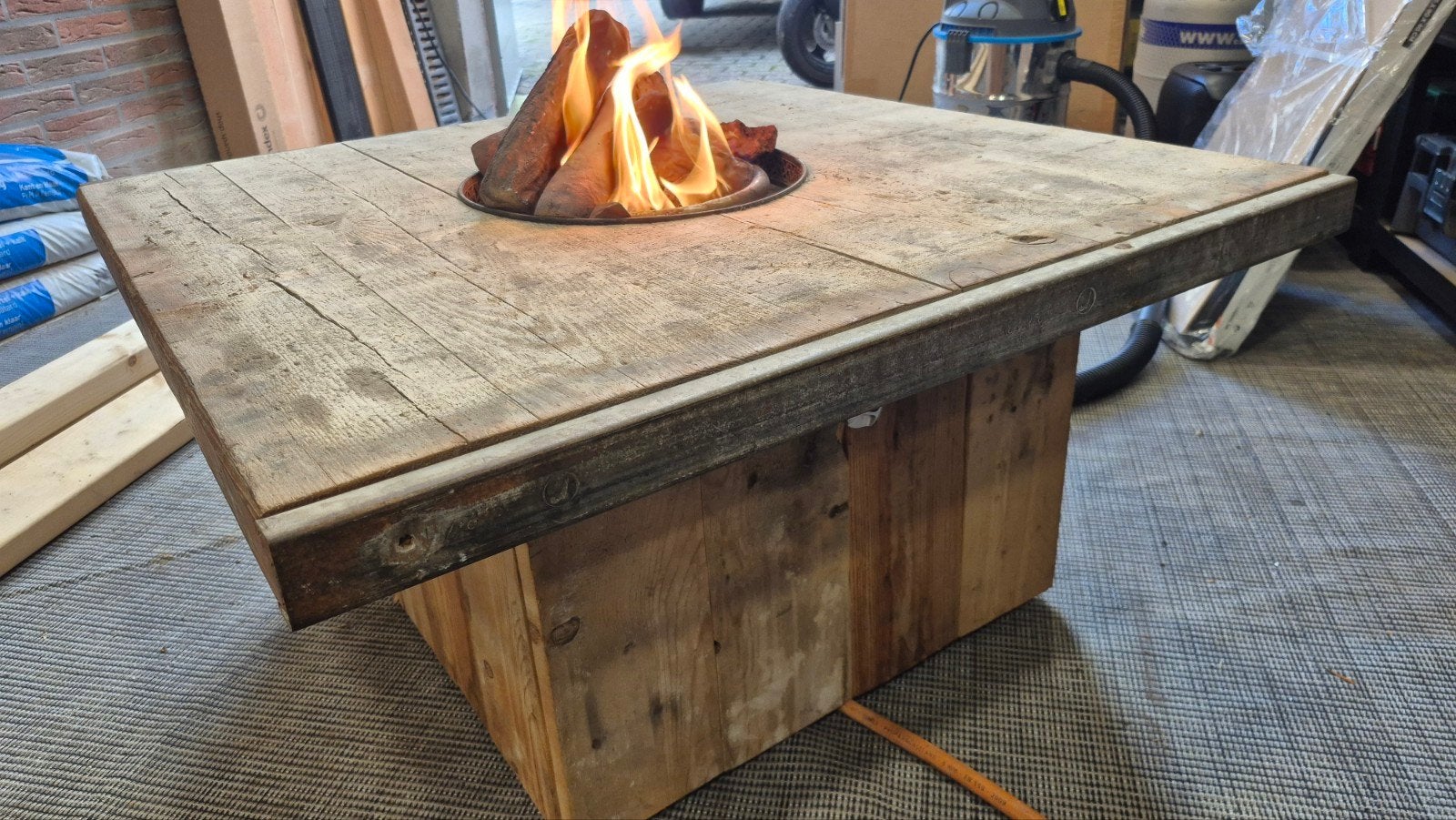 Vuurtafel van steenschot, Ophalen