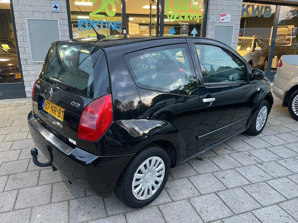 Citroën C2 1.4i Ligne Ambiance Airco Nieuwe apk (bj 2004), Auto's, 450 kg, 4 cilinders, 4 stoelen, Zwart