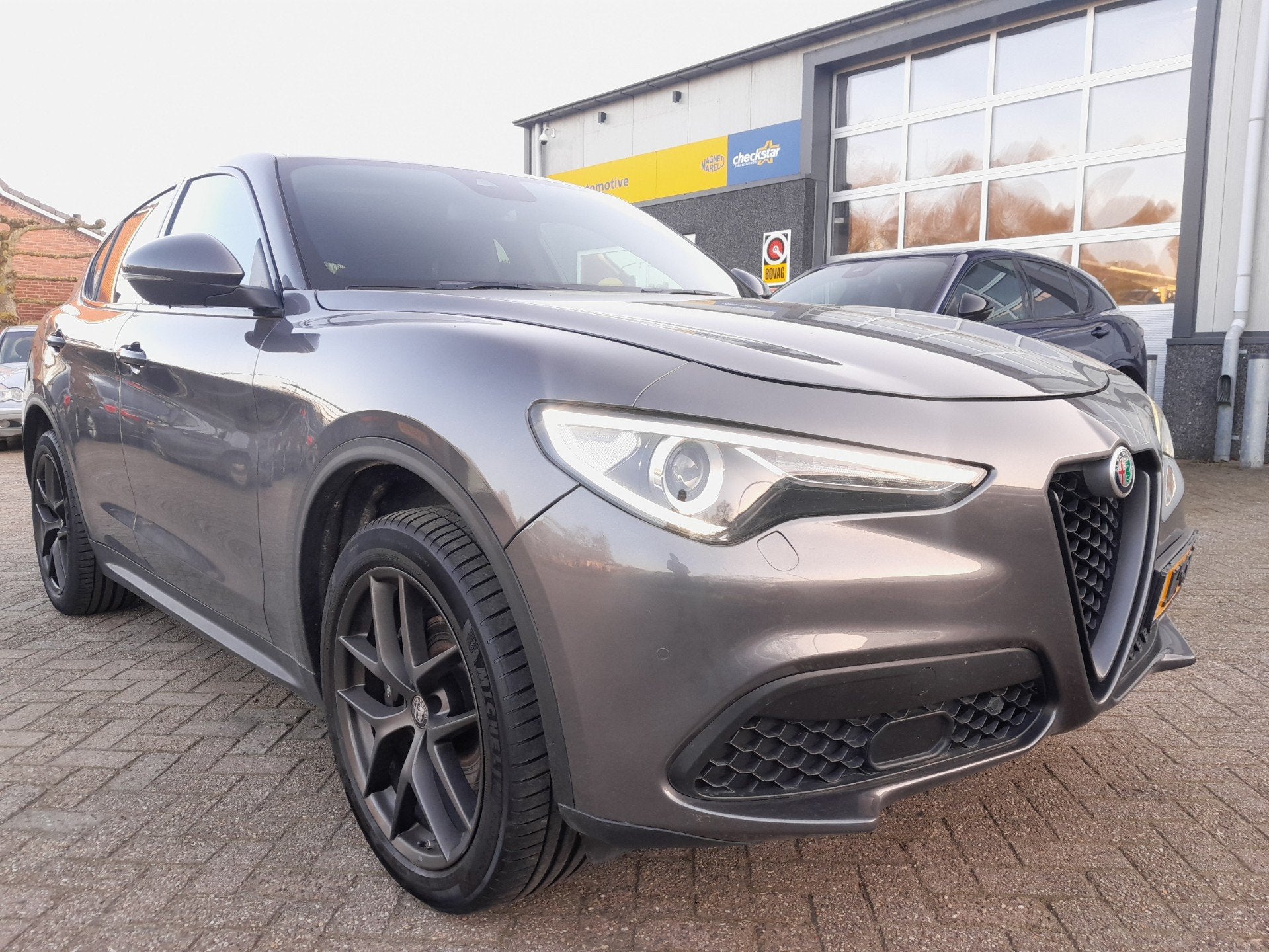 Alfa Romeo STELVIO 2.0 T AWD B-Tech - Leder - Veloce interie, Auto's, Alfa Romeo, Dealer onderhouden, Leder, Bedrijf, Vierwielaandrijving
