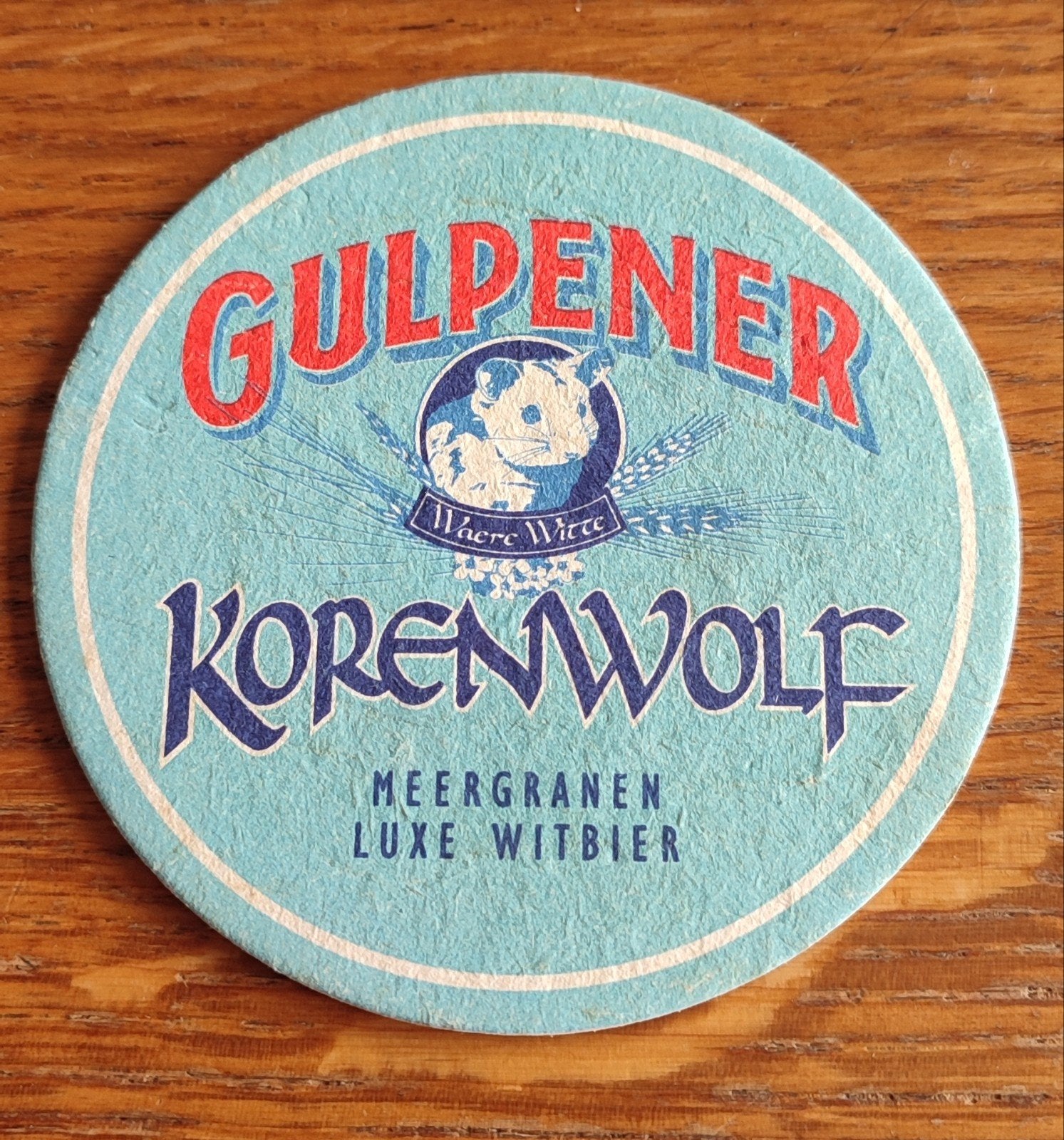 Gulpener Korenwolf Bierviltje - Meergranen Luxe Witbier, Ophalen of Verzenden, Zo goed als nieuw, Viltje(s), Gulpener