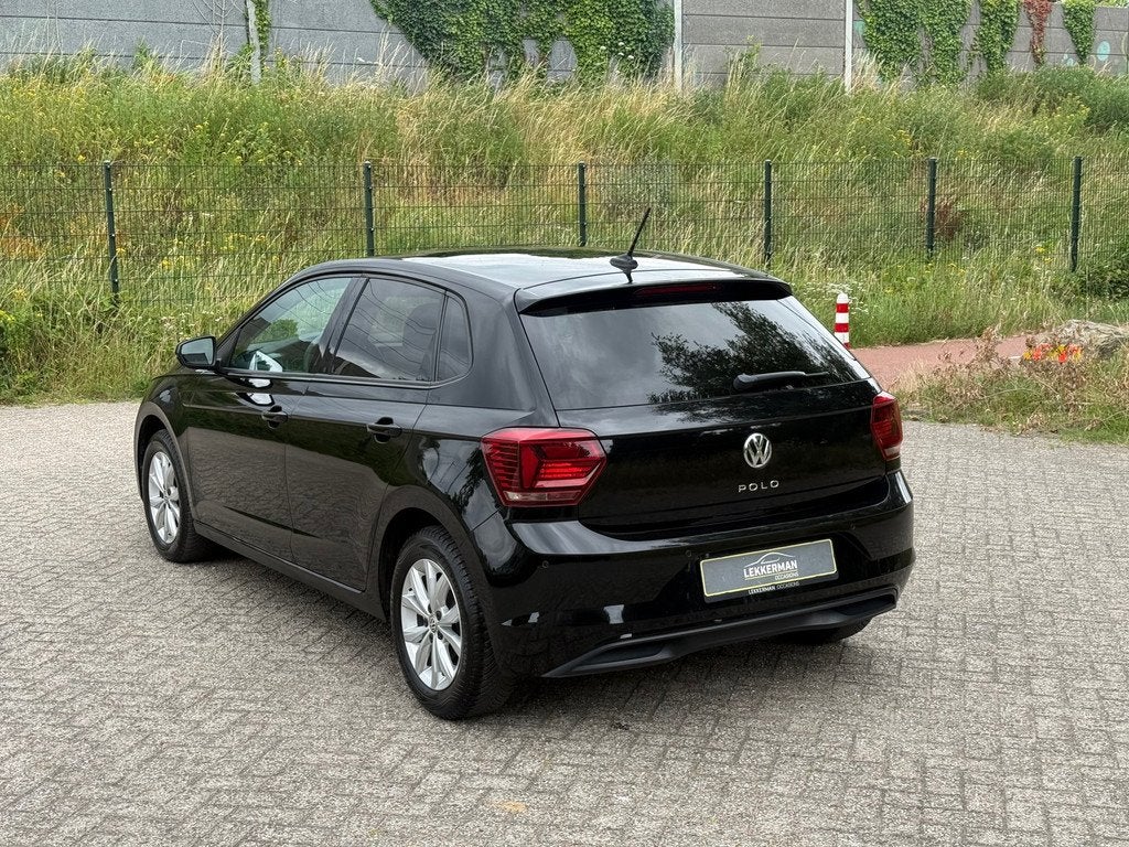 Volkswagen Polo 1.0 TSI Highline DSG I NAVI I CARPLAY I EERS, Gebruikt, Automatische klimaatregeling, 116 pk, Zwart