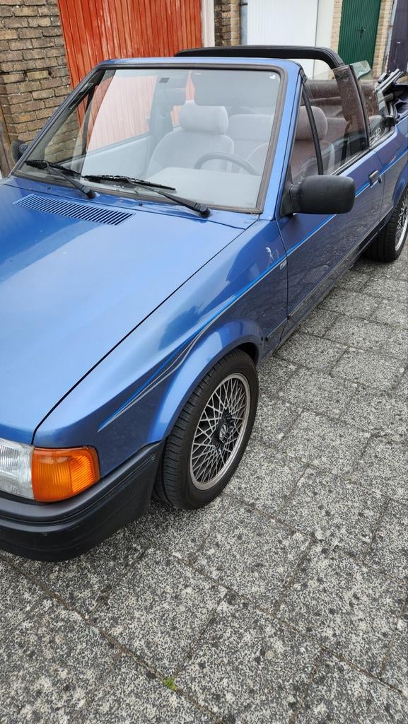 Ford Escort 1.6 Ghia Cabrio 1986 Blauw, Auto's, Escort, 4 cilinders, Cabriolet, Blauw