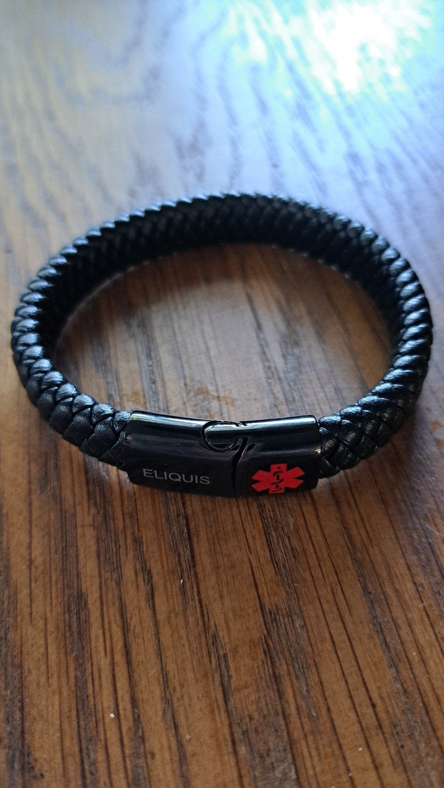 Eliquis = bloedverdunner armband, Verzenden, Zo goed als nieuw, Zwart, Kunststof of Plastic