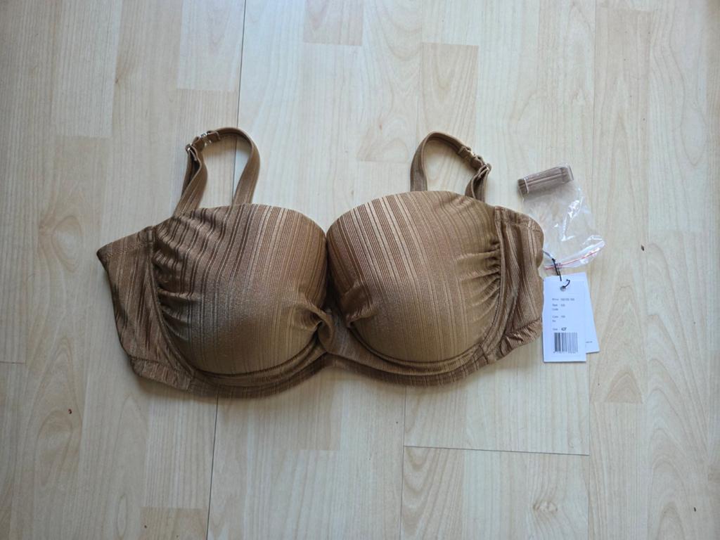 Goudkleurige bikini top Beachlife 42F nieuw
Nieuwprijs €69,9, Ophalen of Verzenden