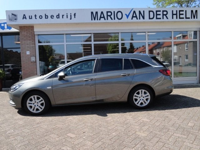 Opel Astra Sports Tourer 1.0 Online Edition Airco/Navigatie, Auto's, Voorwielaandrijving, Stof, Gebruikt, 1178 kg