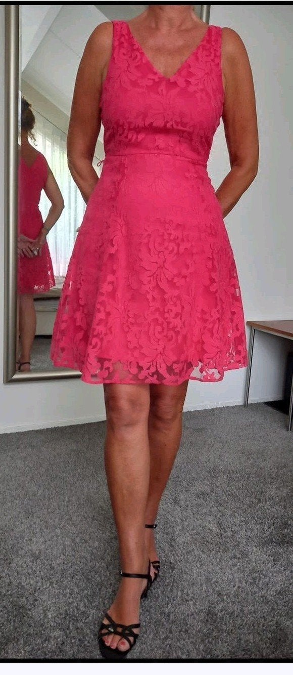 Mooie roze kanten jurk met zwarte strik, Maat 42/44 (L), Ophalen of Verzenden, Steps, Roze