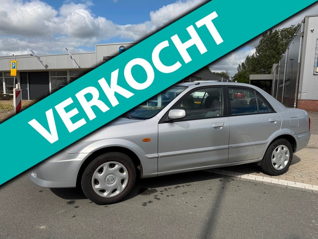Mazda 323 1.6i Exclusive. LAGE KM’S !, Auto's, Mazda, Bedrijf, Te koop, ABS, Airbags, Airconditioning, Centrale vergrendeling