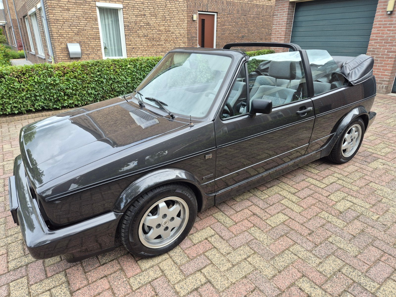 Volkswagen Golf 1.8 Cabriolet 72KW U9 1990 Zwart, Auto's, Voorwielaandrijving, 4 cilinders, Cabriolet, 98 pk