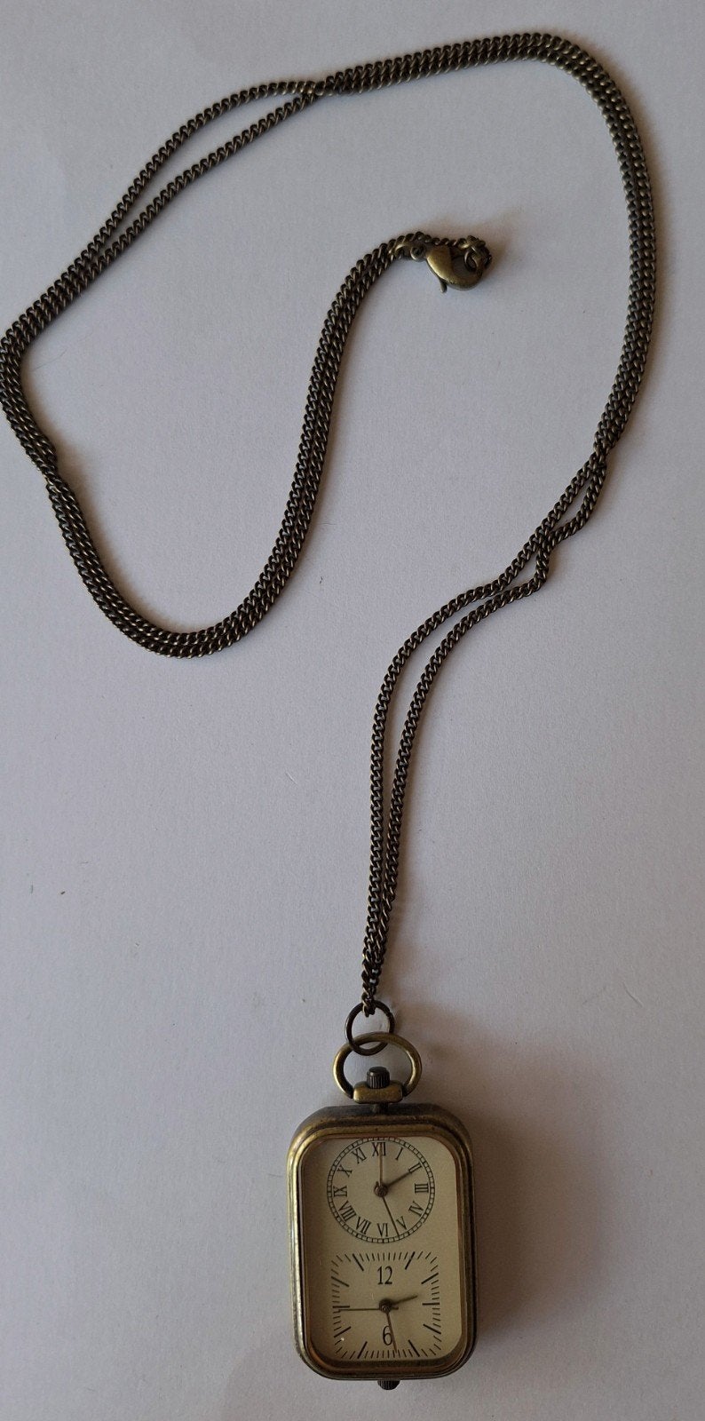 Vintage zakhorloge met ketting - dubbele wijzerplaat, Gebruikt, Bruin, Ophalen of Verzenden, Overige materialen