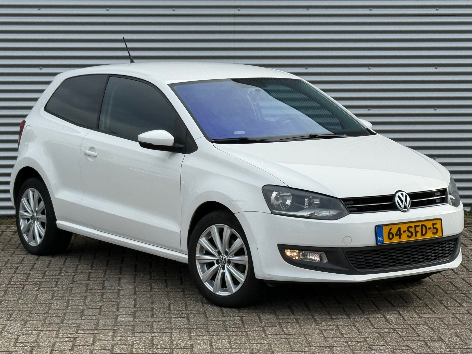Volkswagen Polo 1.2 TSI Comfortline / Sport / LM velgen / Ca, Auto's, Voorwielaandrijving, Wit, Handgeschakeld, 19 km/l
