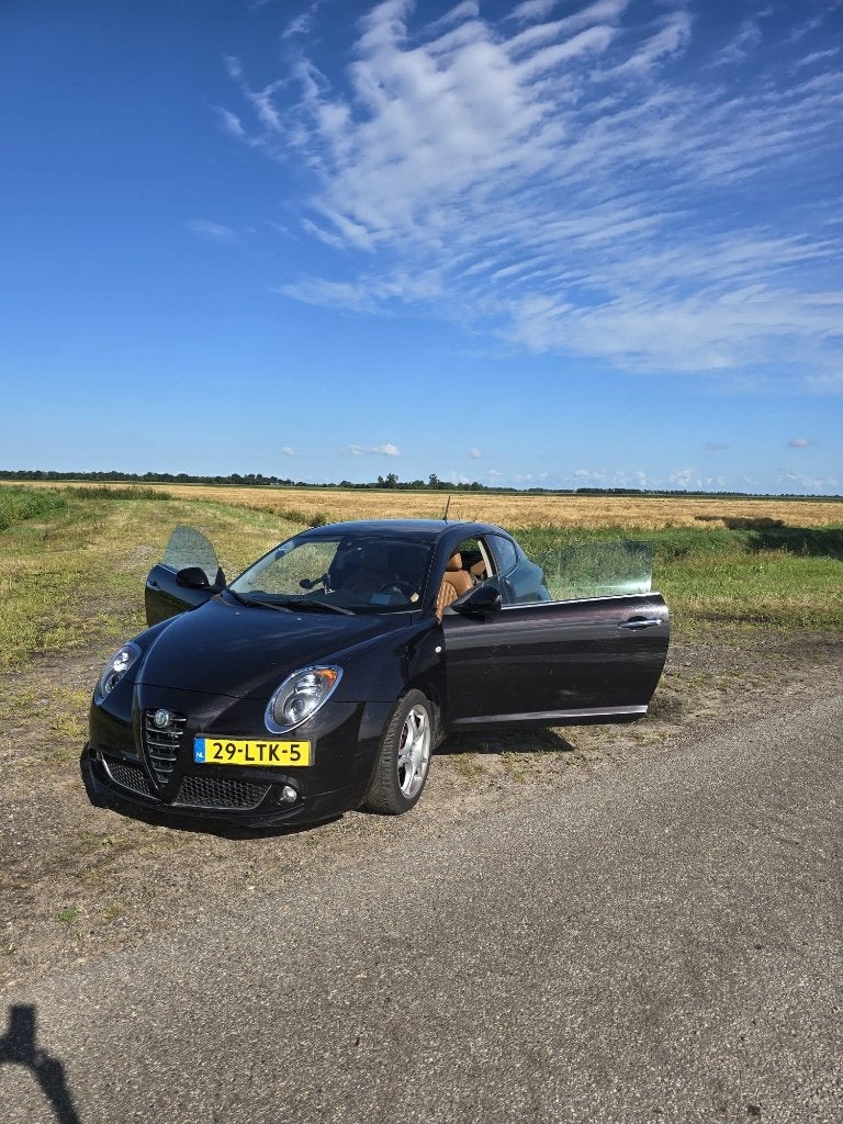 Alfa Romeo MiTo 1.4 16V 77KW Multi AIR 2010 Zwart, Auto's, Voorwielaandrijving, 4 cilinders, Bruin, Handgeschakeld