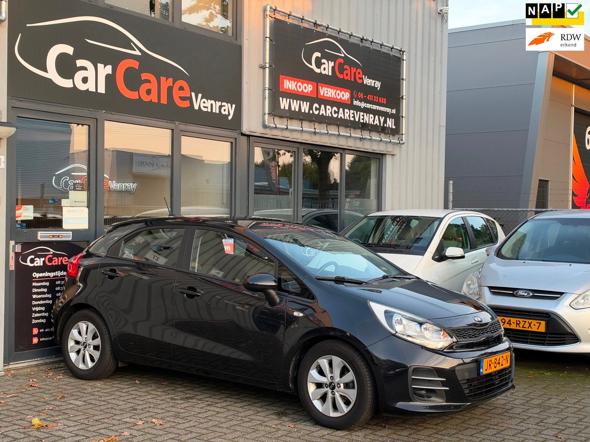 Kia Rio 1.2 CVVT PlusLine Navigator APK03-2027 CAMERA CRUISE, Auto's, 4 cilinders, Zwart, Bedrijf, Handgeschakeld