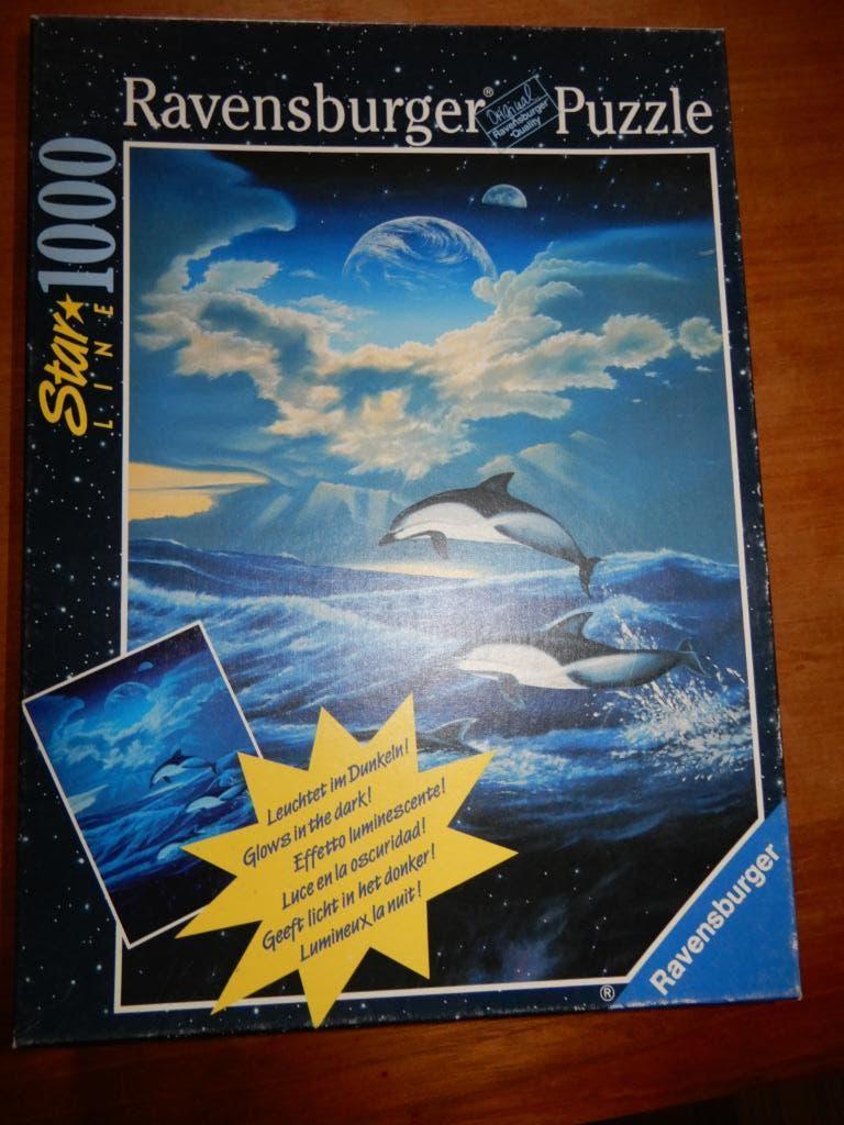 Ravensburger puzzel Starline glow in the dark dolfijn 1000st, Hobby en Vrije tijd, Denksport en Puzzels, Verzenden, 500 t/m 1500 stukjes
