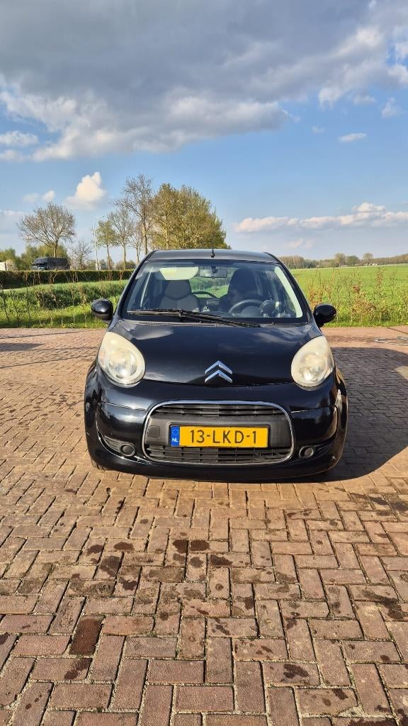 Citroën C1 1.0 5-DRS 2010 Zwart, Auto's, Voorwielaandrijving, Stof, 4 stoelen, C1