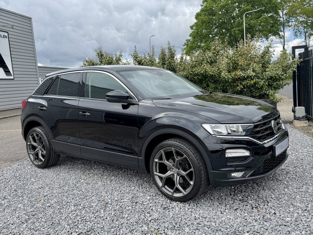 Volkswagen T-Roc 1.0 TSI Style Navi|Media|PDC|Lineast Zwart, Voorwielaandrijving, Stof, Gebruikt, Met garantie (alle)