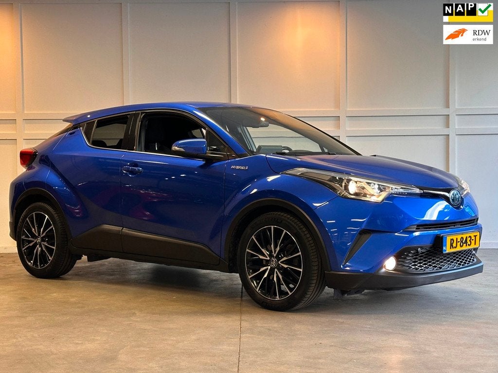 Toyota C-HR 1.8 Hybrid Dynamic / Camera / Trekhaak / Stoelve, Auto's, Stof, Euro 6, Blauw, Hybride Elektrisch/Benzine