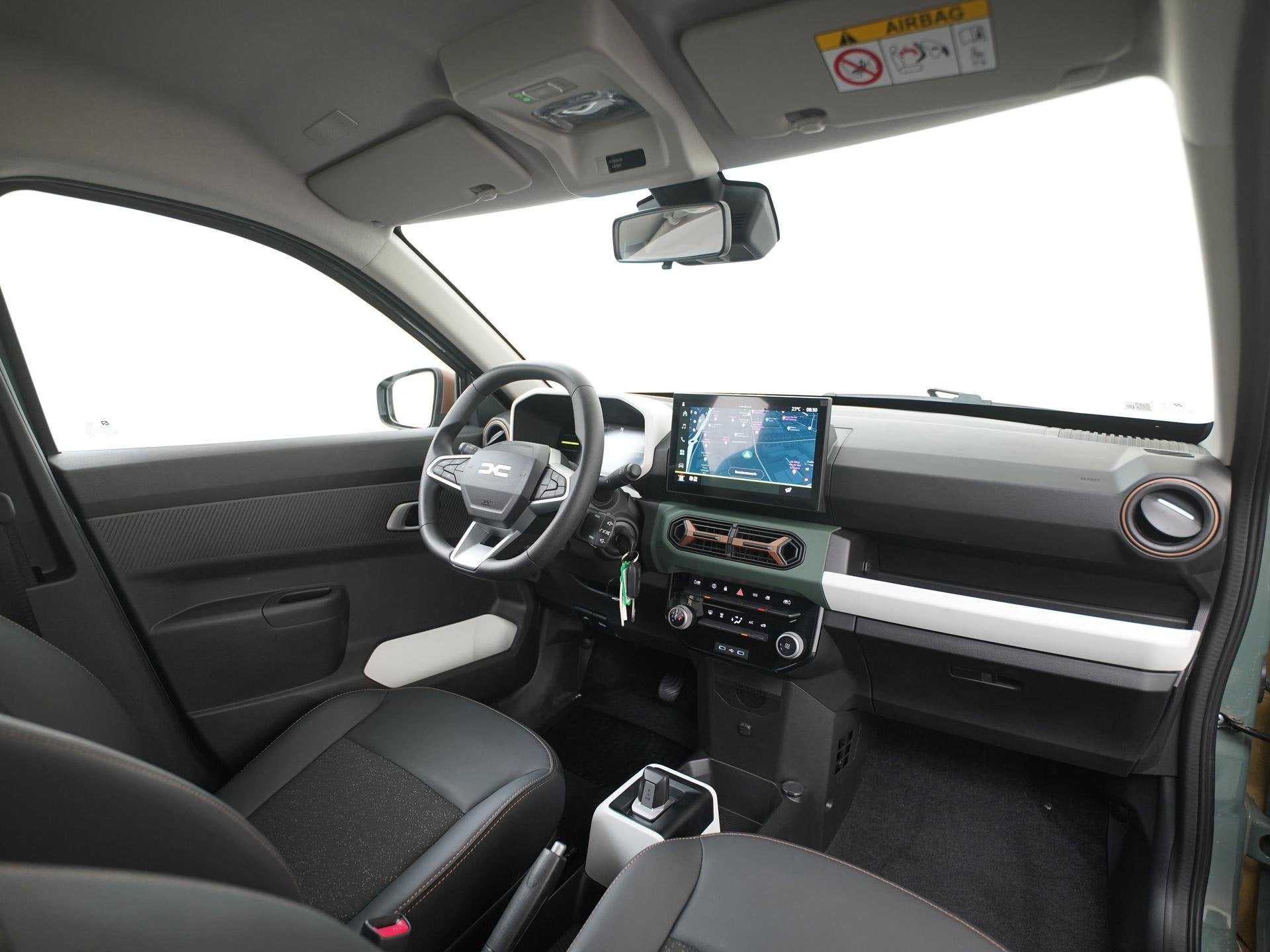 Dacia Spring Extreme 65 26.8 kWh | DC-snelladen | Achteruitc, Auto's, 12 maanden, Gebruikt, 4 stoelen, Leder en Stof