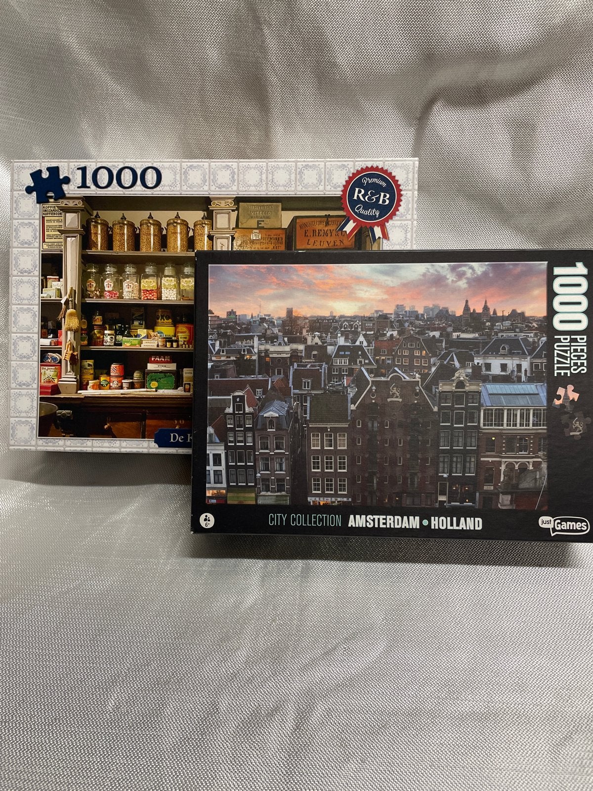 2x 1000 stukjes legpuzzel: De Kruidenier & Amsterdam, Ophalen, 500 t/m 1500 stukjes, Zo goed als nieuw, Legpuzzel