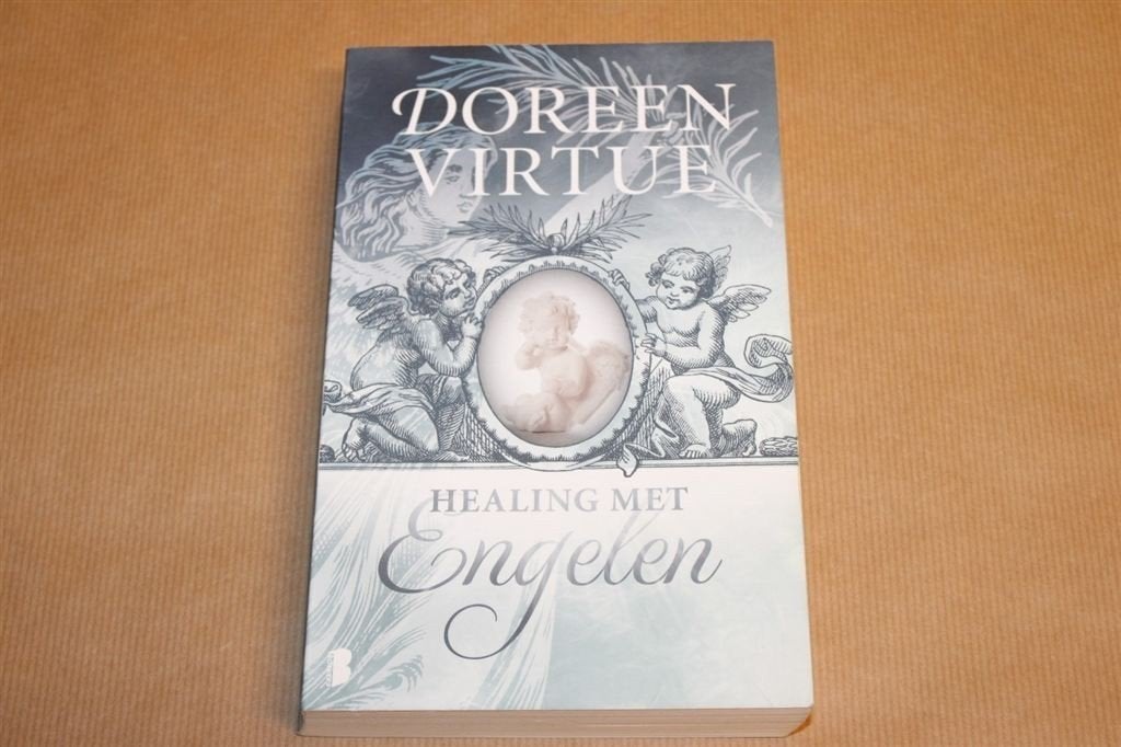 Healing met engelen - Doreen Virtue, Ophalen of Verzenden, Zo goed als nieuw, Overige onderwerpen, Achtergrond en Informatie