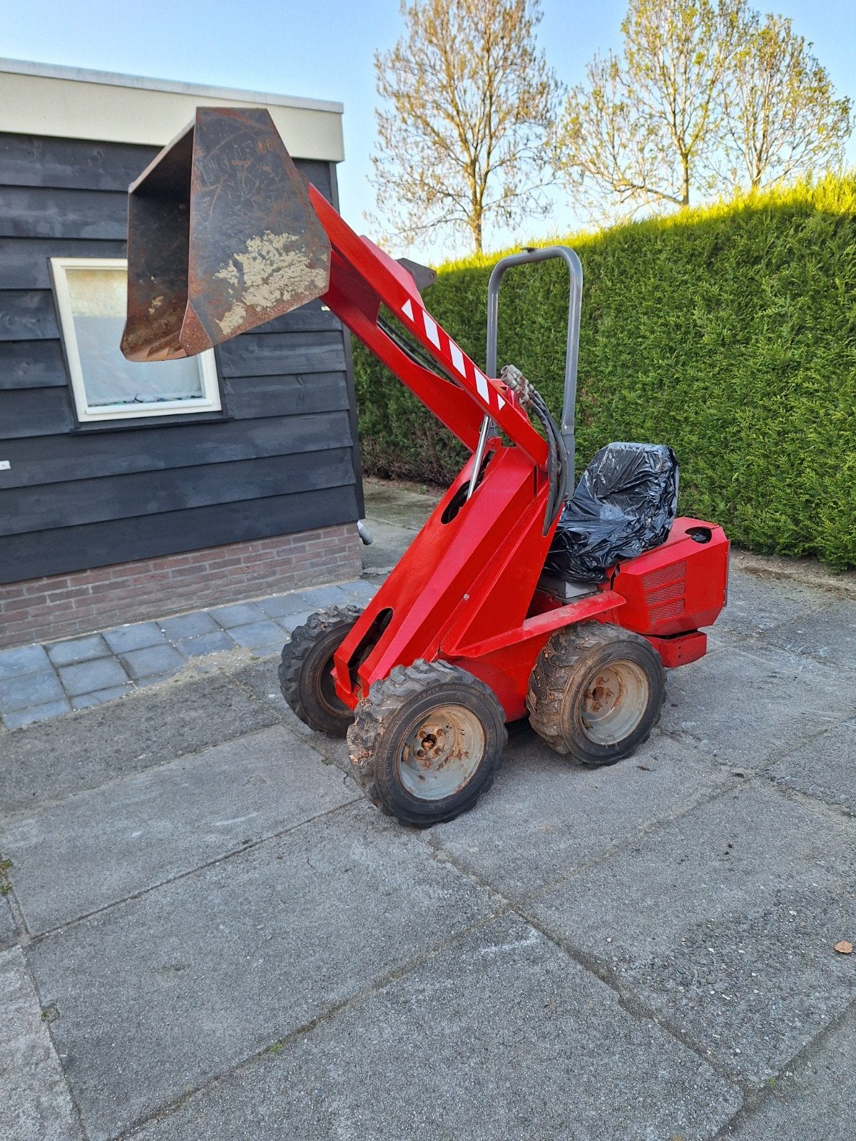 mini shovel, Ophalen