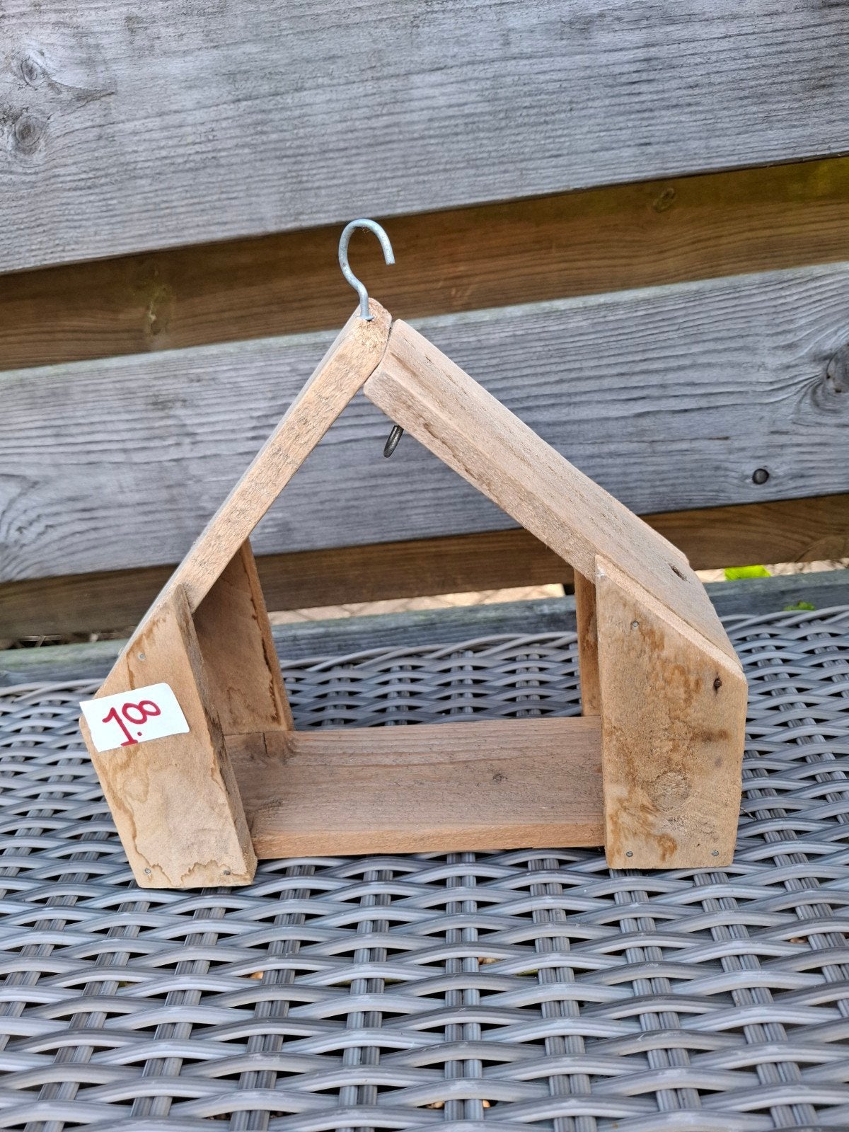 Voederhuisje. Vogelhuisje, Ophalen