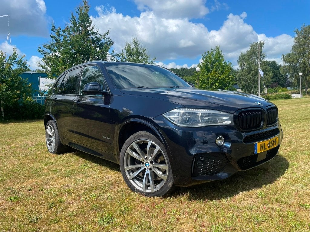 BMW X5 Xdrive40e Iperformance 313pk Aut 2015 Zwart, Auto's, 4 cilinders, Zwart, Vierwielaandrijving, 147 €/maand