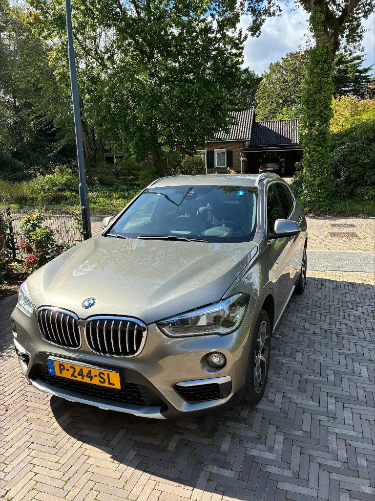 BMW X1 Sdrive18i 140pk Aut 2017 Grijs, Auto's, Navigatiesysteem, Euro 6, Leder, 19 km/l
