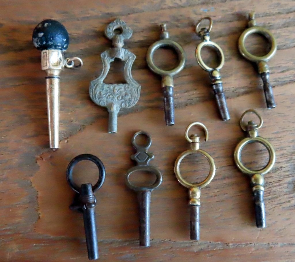 Uit inboedel: 9 Antieke horlogesleutels /1 met 14 krt goud e, Overige merken, Zakhorloge, Verzenden, Goud