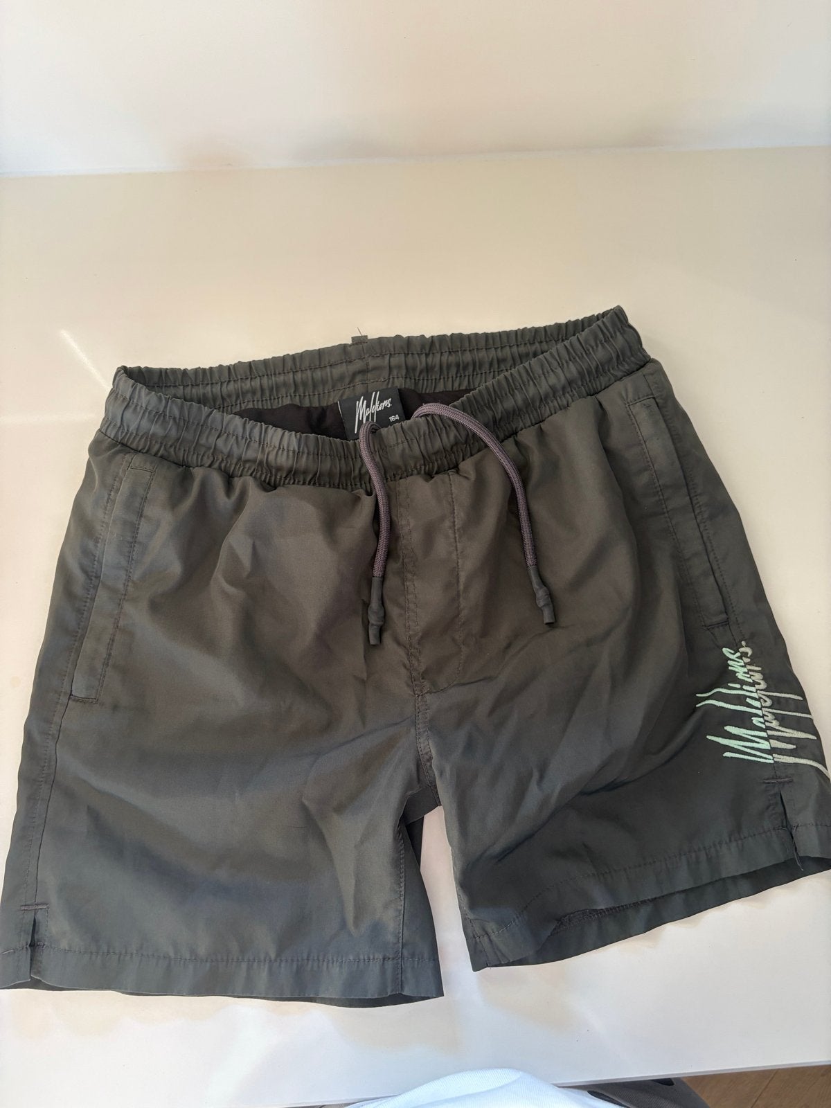 Malelions zwemshort - Donkergrijs - Maat 164, Kleding | Heren, Badmode en Zwemkleding, Ophalen of Verzenden, Overige maten, Grijs