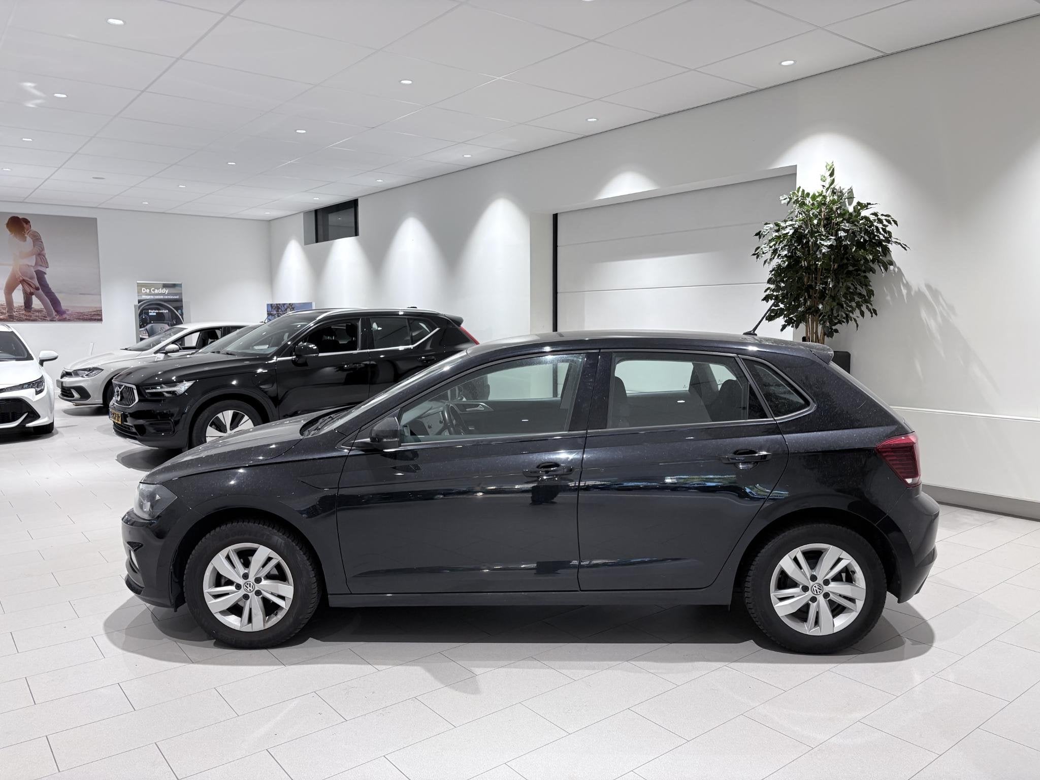 Volkswagen Polo 1.0 TSI Highline, Auto's, Voorwielaandrijving, 12 maanden, Stof, Zwart