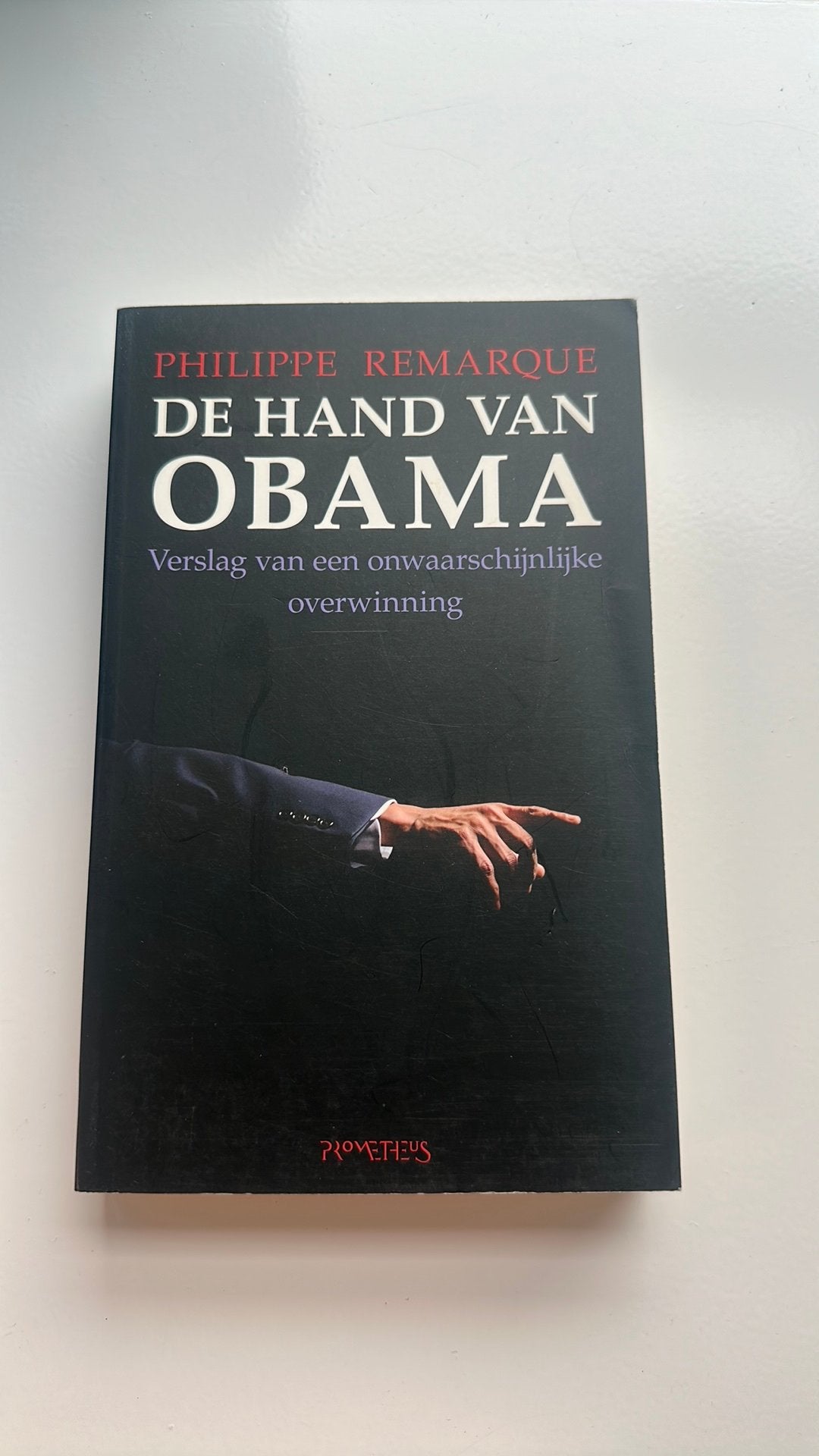 Philippe Remarque - De hand van Obama, Boeken, Philippe Remarque, Ophalen of Verzenden, Zo goed als nieuw, Wereld