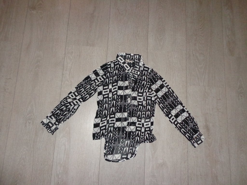 zwart/wit meisjesblousje van JACKY, maat 104, Ophalen of Verzenden, Zo goed als nieuw, Meisje, Overhemd of Blouse