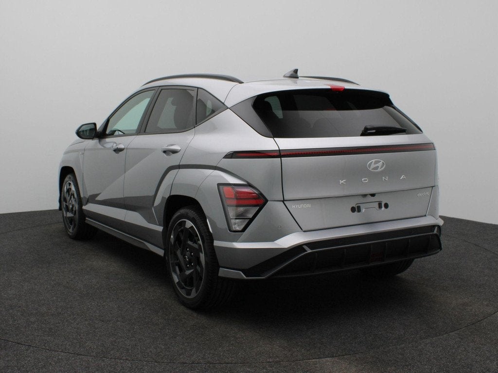 Hyundai Kona Electric N Line Business 64.8 kWh | Warmtepomp, Auto's, Hyundai, Stof, Zwart, Met garantie (alle), Automatische klimaatregeling