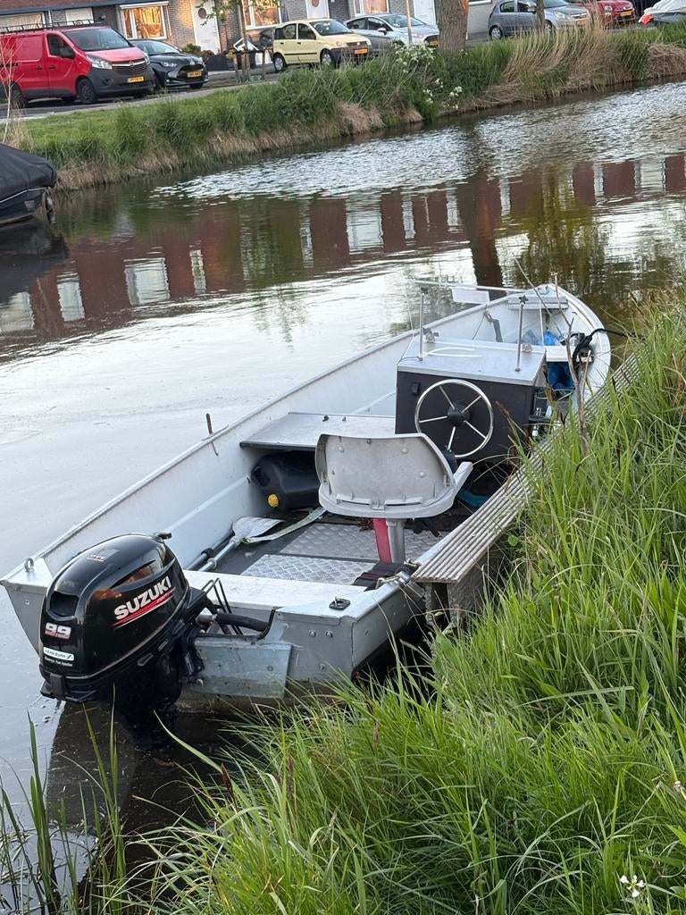 Verhoef aluminium toerboot 4.10m met Suzuki 9.9pk (vaarklaar, Ophalen, 10 tot 30 pk, Gebruikt, Aluminium