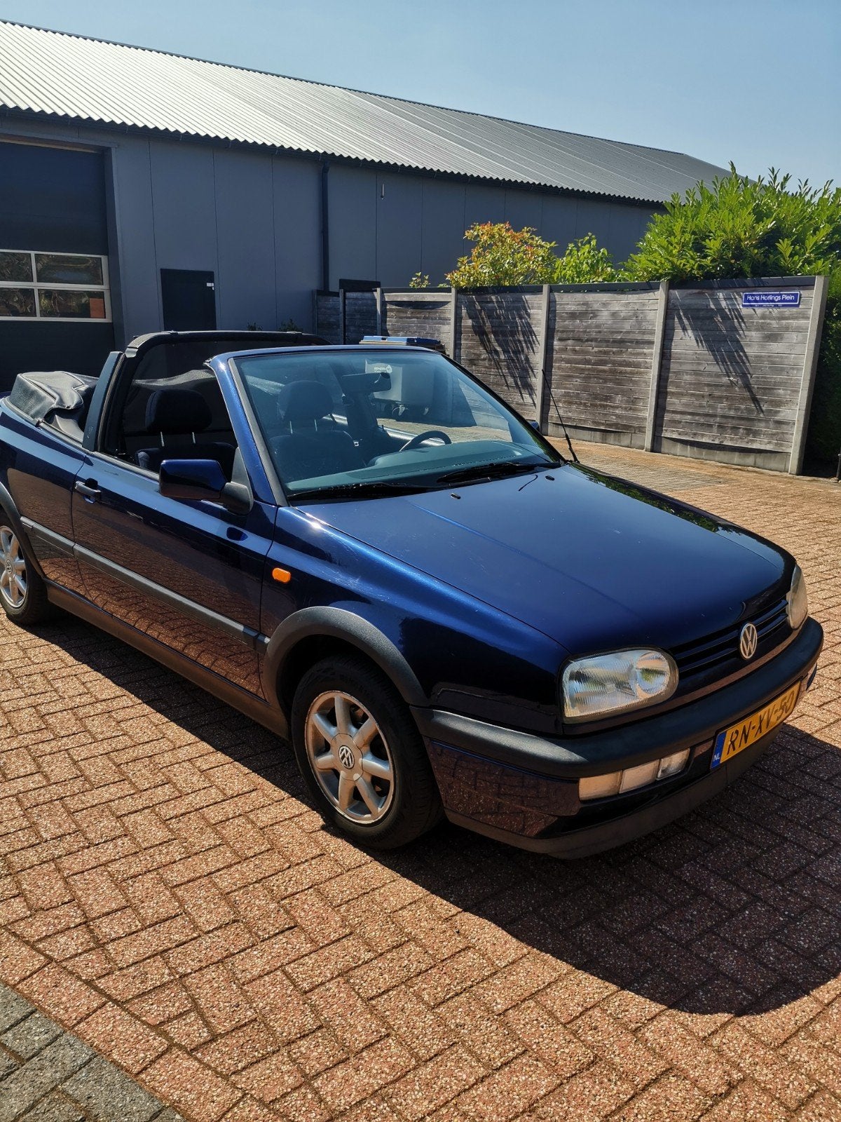 Volkswagen Golf 1.8 Cabriolet 66KW AUT E2 1997 Blauw, Auto's, 4 cilinders, Cabriolet, Blauw, Origineel Nederlands