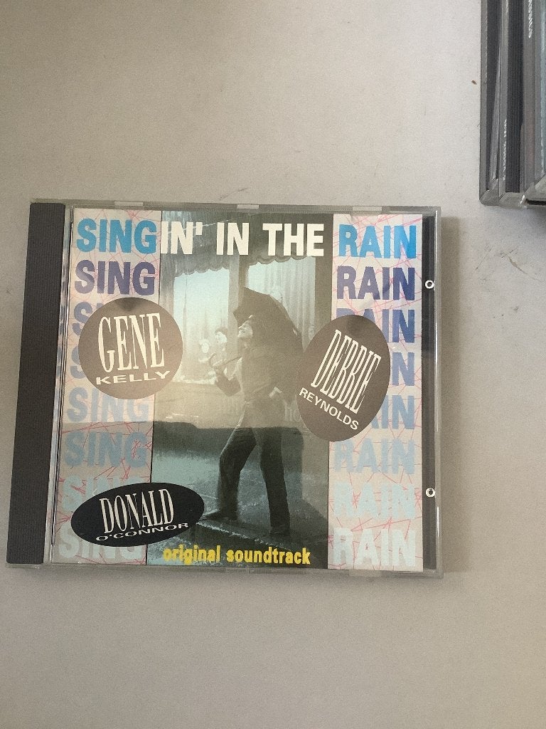Singing in the rain., Verzenden, Zo goed als nieuw, Pop
