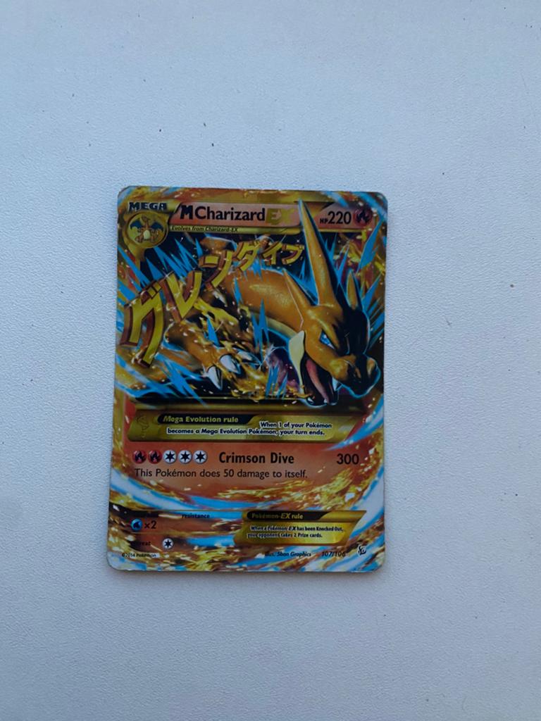 Mcharizard ex 107/106, Ophalen of Verzenden, Zo goed als nieuw
