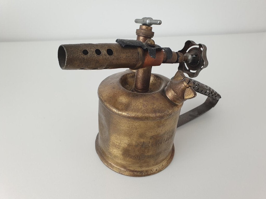 Antieke messing brander, Ophalen