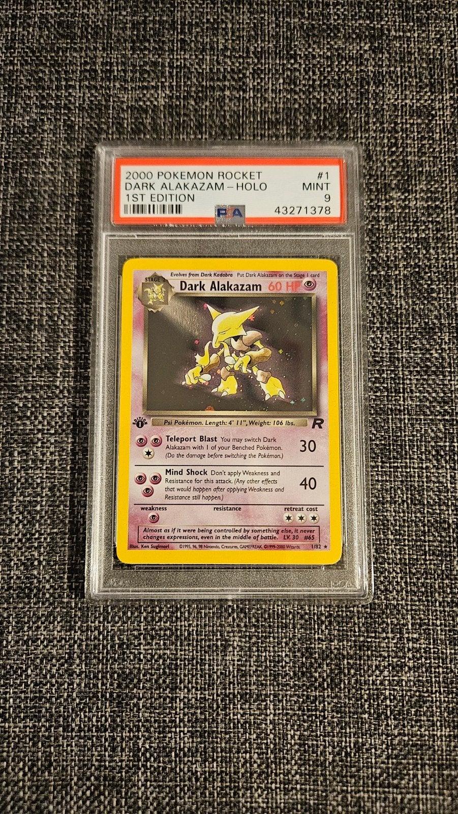 2000 Pokémon Team Rocket 1st Ed. Dark Alakazam Holo PSA 9, Hobby en Vrije tijd, Ophalen of Verzenden, Zo goed als nieuw, Losse kaart