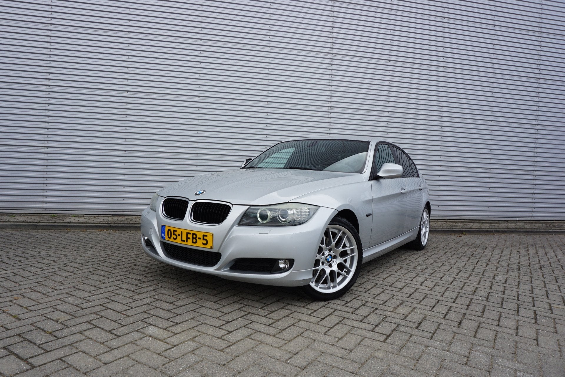 BMW 3-serie 316i Business Line Airco / Navi / Cruise / Carpl, Auto's, Euro 5, Gebruikt, 1599 cc, 4 cilinders