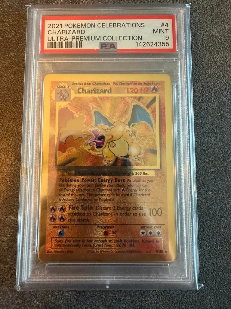 Pokémon Gold Metal Charizard Celebrations UPC Graded PSA 9, Ophalen of Verzenden, Zo goed als nieuw