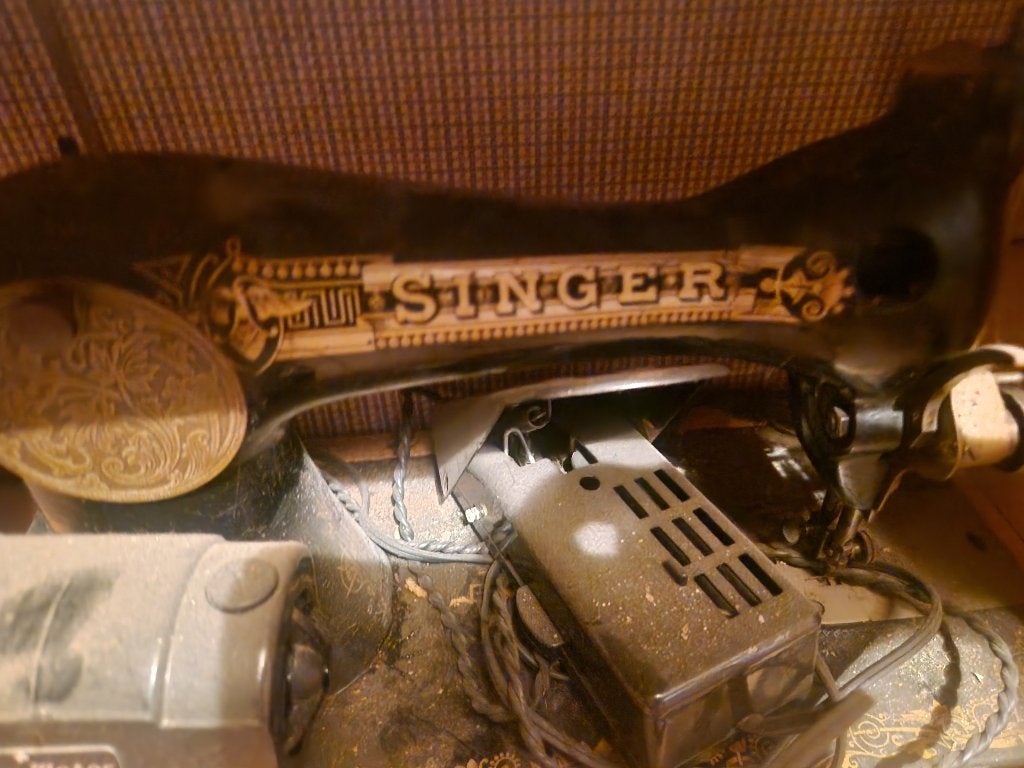 Singer naaimachine in koffer, Ophalen