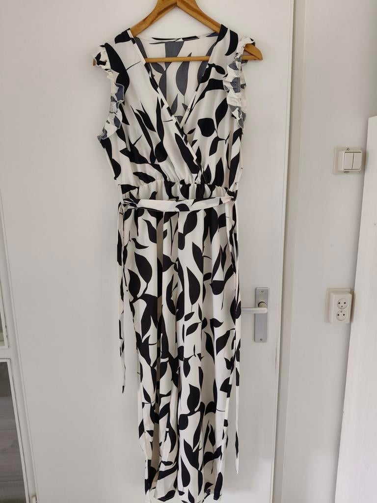Mooie Jumpsuit.  Nieuw. L.  Wijde pijp, Ophalen of Verzenden, Nieuw